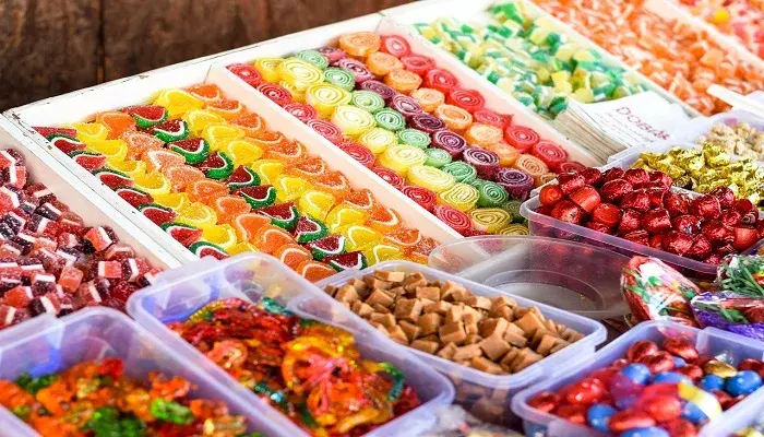 doces coloridos que a indústria produz e com isso traz malefícios da frutose.
